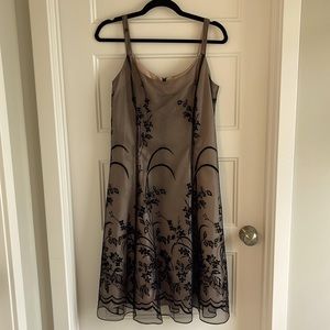 Black embroidered mid length dress. Size 12.